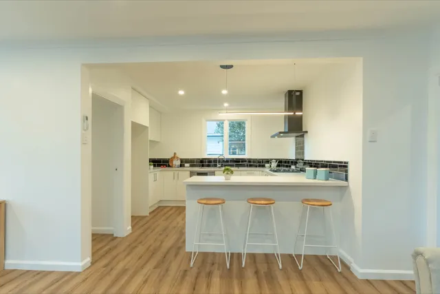 Staged kitchen viewed from living room