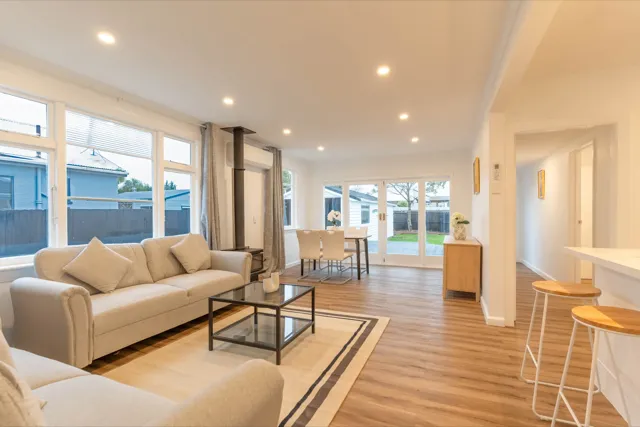 Staged open plan living through to dining