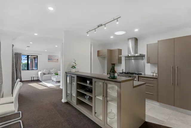 Staged kitchen viewed from living room